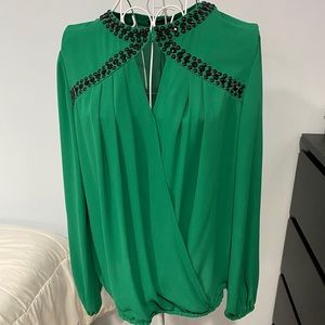 Green and black long sleeve blouse